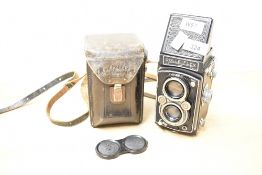 A Rolleiflex Automat reflex camera (930550) with Tassar 1:3,5 7.5cm lens having Campur-Rapid Shutter
