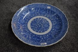 A large presumed 19th to 20th century Japanese Imari ware pottery dish, featuring a scalloped edge