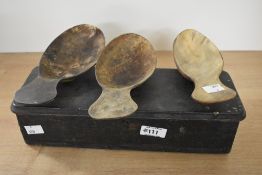 Three 20th-century African Art carved spoons; sold with an elongated wooden box, (4), condition is