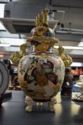A large late 19th to 20th century Japanese Satsuma ware vase, featuring colourful hand painted
