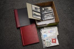 Isle of Man interest* A post card album, stamp album and first day covers (various and incomplete)