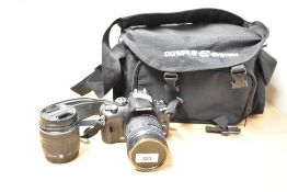 An Olympus E400 DSLR camera with Olympus Digital 40-150mm 1-4-5,6 lens, and Olympus 14-42mm 1:3,5-