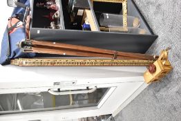 A selection of mid 20th-century wood Surveyors measuring apparatus, to include a large inverted