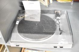A modern ION TTUSB05 USB turntable, designed for playing vinyl records and converting them into