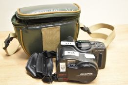 An Olympus AZ-330 Superzoom 35mm camera with fixed Zoom 38-105mm 1:4,5-6 lens in soft camera bag
