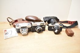Three cameras. A Pentas ME Super with Pentax-M 1:1,7 50mm lens, an Ilford Sportsman 300, and a
