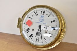 A late 20th-century Sewills of Liverpool Commemorative Edition brass ships bell clock, produced
