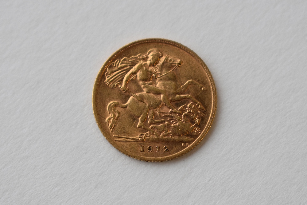 A George V 1912 Gold Half Sovereign, Royal Mint, Rev George and Dragon. 4.00 Grams - Image 2 of 2