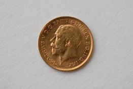 A George V 1912 Gold Half Sovereign, Royal Mint, Rev George and Dragon. 4.00 Grams
