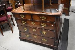A good 19th century figured mahogany chest of drawers, the rectangular string inlaid and banded