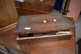 A small stained pine box containing mixed vintage games, including 'The Viking Game' dominoes etc