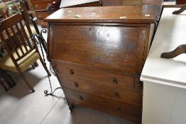 An early 20th Century oak bureau , width approx. 84cm, height 102cm