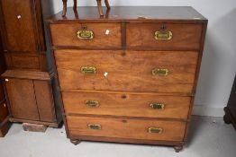 A 19th century brass bound mahogany campaign chest of 2/3 drawers, each drawer with applied brass