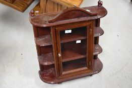 A small reproduction wall mounted display unit, with central glazed 53cm x 45cm