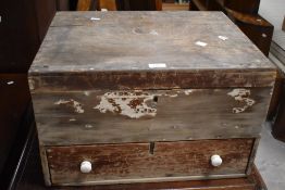 An early 20th century stained pine Day & Son's original universal medicine chest, retaining the