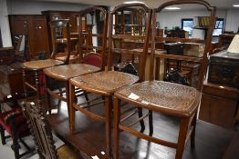 A group of three Edwardian cane seated chairs, 89cm x 40cm x 38cm sold along with a late Victorian