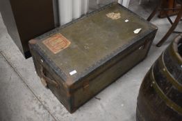 A Vintage travel trunk, of hinged rectangular form 33cm x 78cm x 43cm