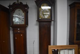 A 19th Century oak and mahogany long cased clock having eight day movement and painted dial named