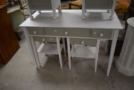 A white and grey painted side table with three drawers and tapering square section legs, 76cm x