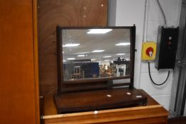 A 19th Century mahogany toilet mirror having platform base, width approx. 63cm