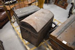 Two antique tin trunks, one with domed top, the other with moulded ribs