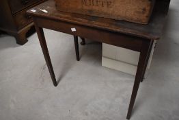 A small Edwardian mahogany occasional table, with tapering square section legs 67cm x 69cm x 45cm