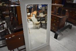 A large modern rectangular wall mirror with bevelled plate and grey painted and moulded frame,