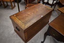 A Victorian scumbled-pine blanket box, thought to be Scottish, of hinged rectangular form, the lid