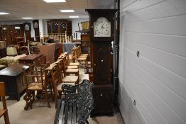 A reproduction stained pine long case clock by Europine, Devonshire 186cm