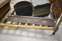 A Victorian copper mounted fender with applied brass ornaments 128cm