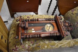A mahogany Vienna style wall clock, of traditional design, damage to base pendant 100cm