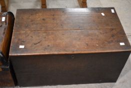 A 19th century oak box, of plain hinged rectangular form with carrying handles to the sides 37cm x