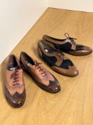 Two pairs of vintage leather brogues, in tan, black and brown mixed leathers, laced, sizes 40 and
