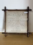 An early 19th century framed and glazed needlework sampler, performed by Margaret Woodhouse in 1826,