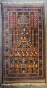 A vintage Afghan Baloch rug, in red, orange, blue and brown, having an architectural temple all-over