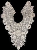 A 19th century Victorian lace collar, of large size, diamond shape and ornate design, having