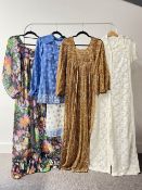 Three 1960s dresses and a twopiece, to include two beachy or poolside smock dresses in transparent