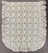 A 19th century vintage bedspread in woven cotton with a vintage honeycomb patchwork print pattern,