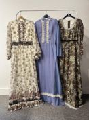 Three 1970s style prairie dresses, featuring high necks, crochet lace trim and bell sleeves, to