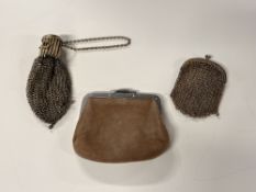 Three antique and vintage purses, two chain link in brass and a tan suede coin purse with white