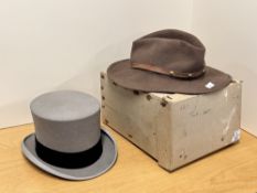 A 20th century vintage Austin Reed of Regent St top hat in sable grey with black band, in original