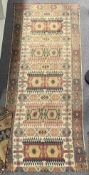 Two Kilim runner rugs, having geometric gul repeat motif, in red, yellow and blue cotton, the larger