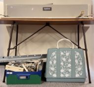 A quantity of sewing and knitting apparatus to include two machines; a Jones Sew Tric in baby blue