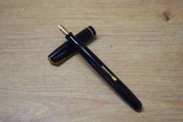A Waterman 502 lever fill fountain pen in Black with single cap band having Watermans 14CT England