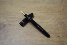A Mabie Todd & Co Swan 3320 Self filler lever fill fountain pen in Black with three narrow cap bands