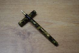 A Watermans Ideal 32 1/2lever fill fountain pen in Green marble with single narrow band to
