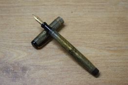 A Mabie Todd & Co Swan L212/90 twist fill fountain pen in Pearl Grey Lizard Skin with two narrow cap