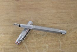 A boxed Rotring 600 converter fill fountain pen of hexagonal form