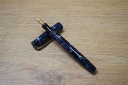 A Mabie Todd & Co Blackbirsd 5242 lever fill fountain pen in Black and Blue marble having