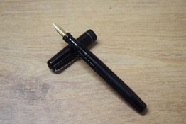 A Mabie Todd & Co Swan Self Filler lever fill fountain pen in Black with single cap band having Swan